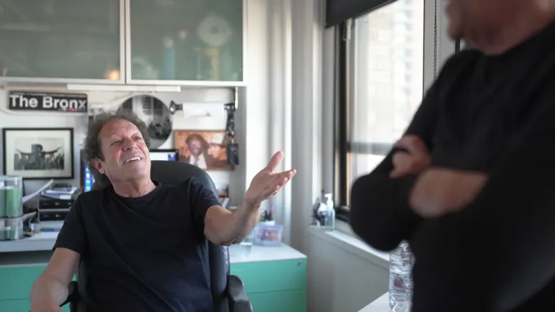 Joe in conversation during production